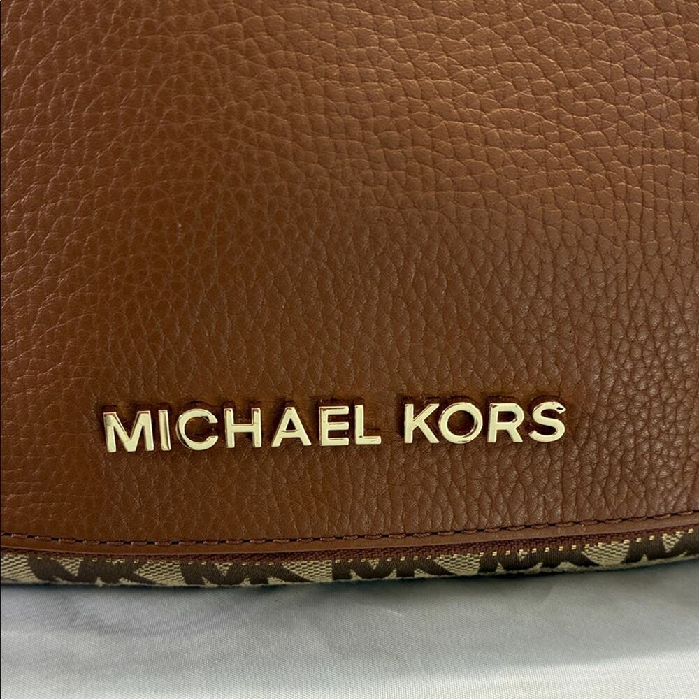 Michael Kors Brown and Tan Messenger Crossbody Bag with thick crossbody strap. - Picture 10 of 11